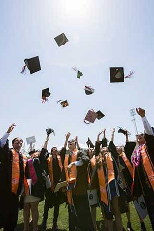 Graduates Throwing Their Caps in the Air